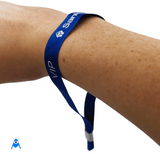 Custom printed wristband on person