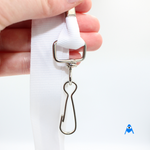 Holding flat white lanyard with swivel clip