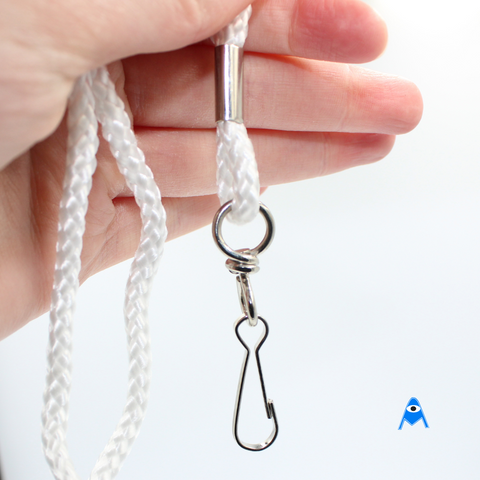 Holding white cord lanyard with swivel clip