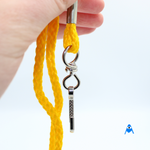 Holding yellow cord lanyard with swivel clip